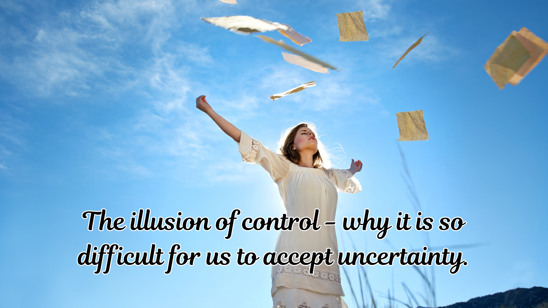 A woman releases sheets of paper into the sky, symbolizing liberation from control