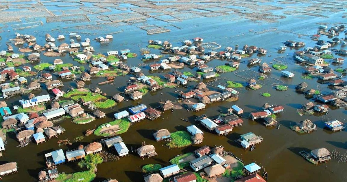 Ganvie floating village in Benin with houses built on stilts over water