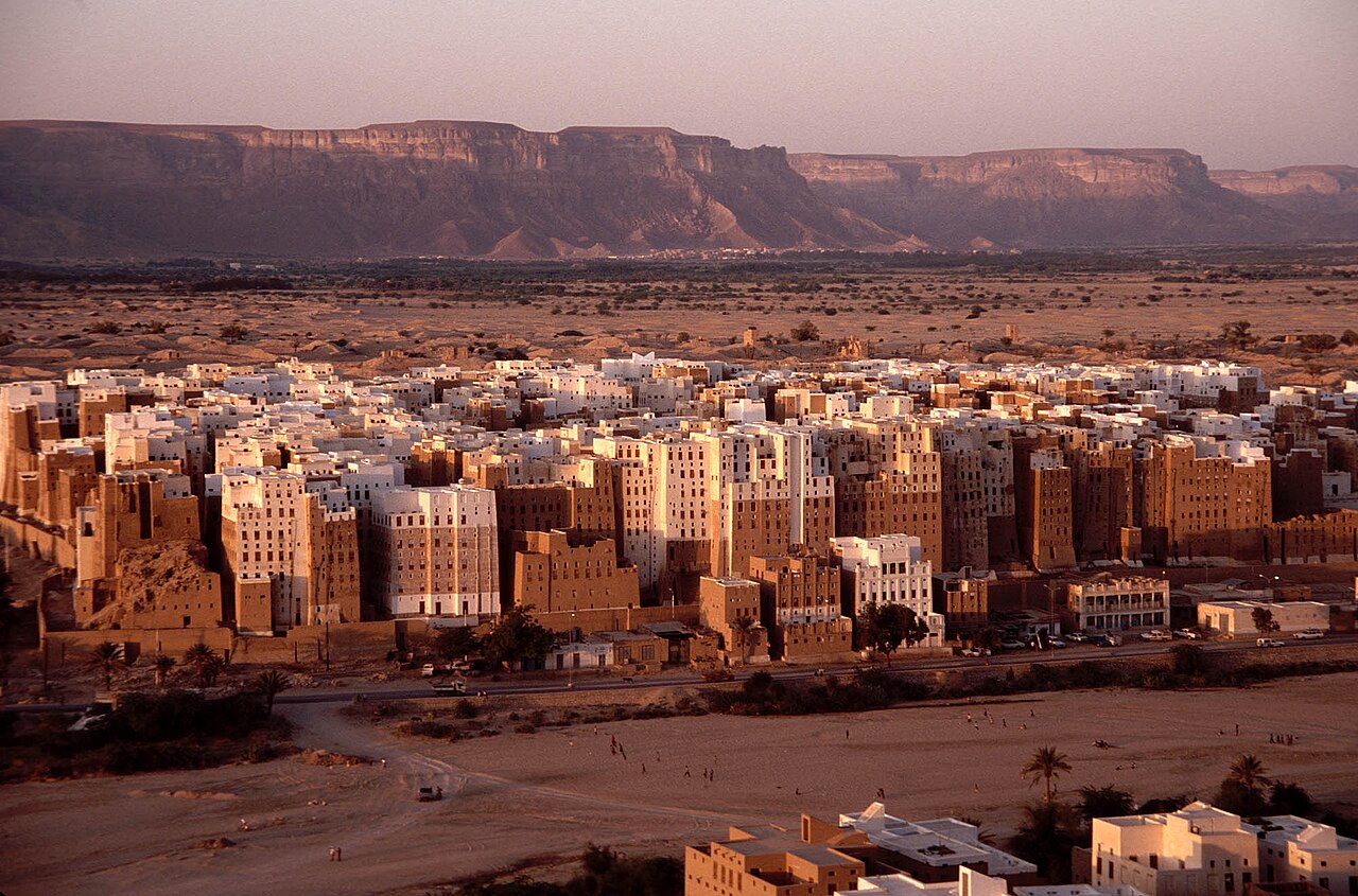 Shibam mud skyscrapers city in Yemen surrounded by desert valley